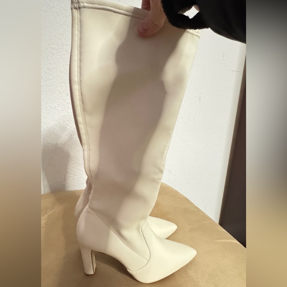 Larroude Cream very elegant just under the knee pull on boots. No stretch